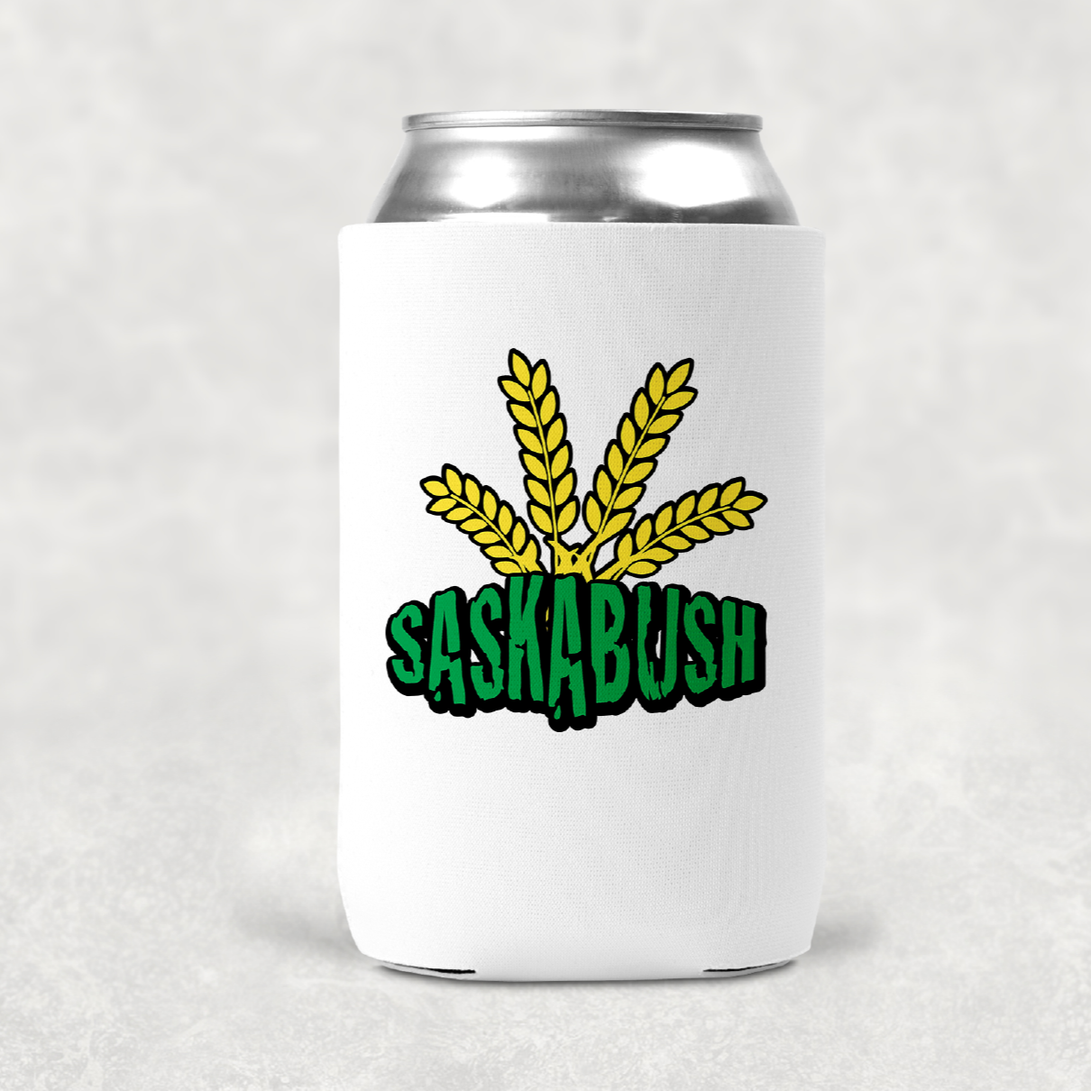 A white can koozie with green Saskabush and yellow wheat behind it