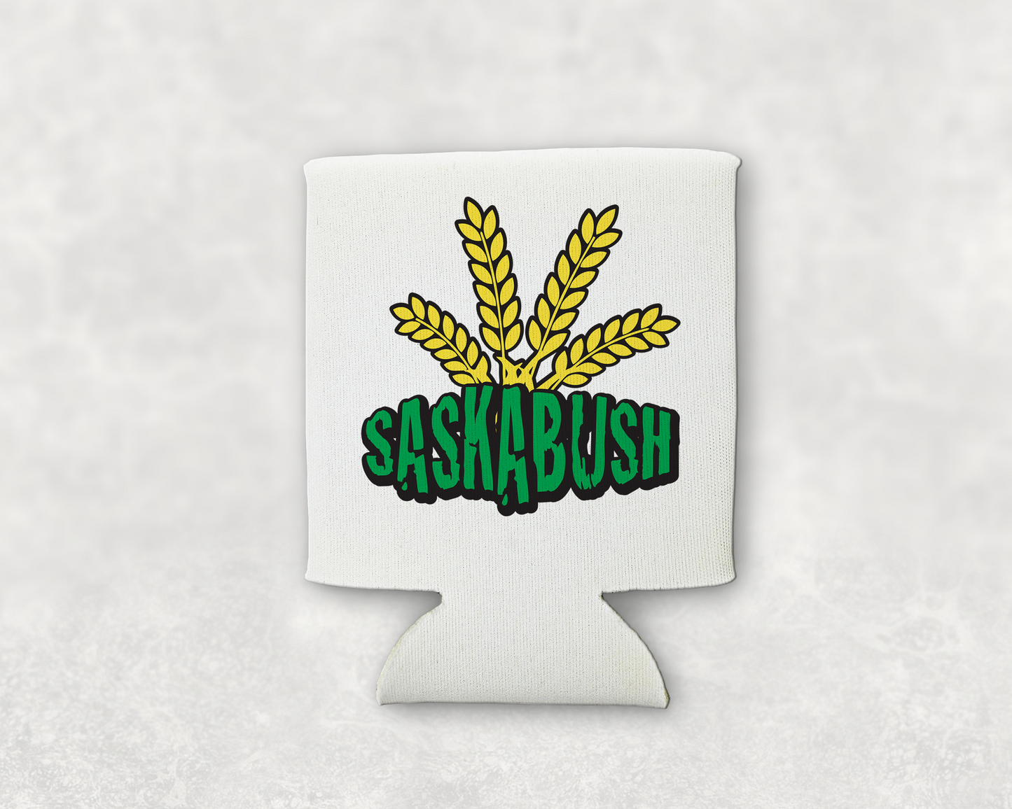 A white can koozie with green Saskabush and yellow wheat behind it