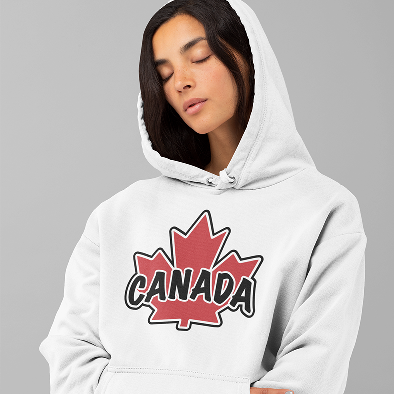 a young woman with a relaxed look on her face with her eyes closed wearing a white heavy hoodie with a Canadian maple leaf and the word Canada on the chest