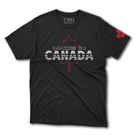 A black t-shirt with a Canadian maple leaf on the front chest that says made in Canada and a maple leaf on the left sleeve with the word patriot